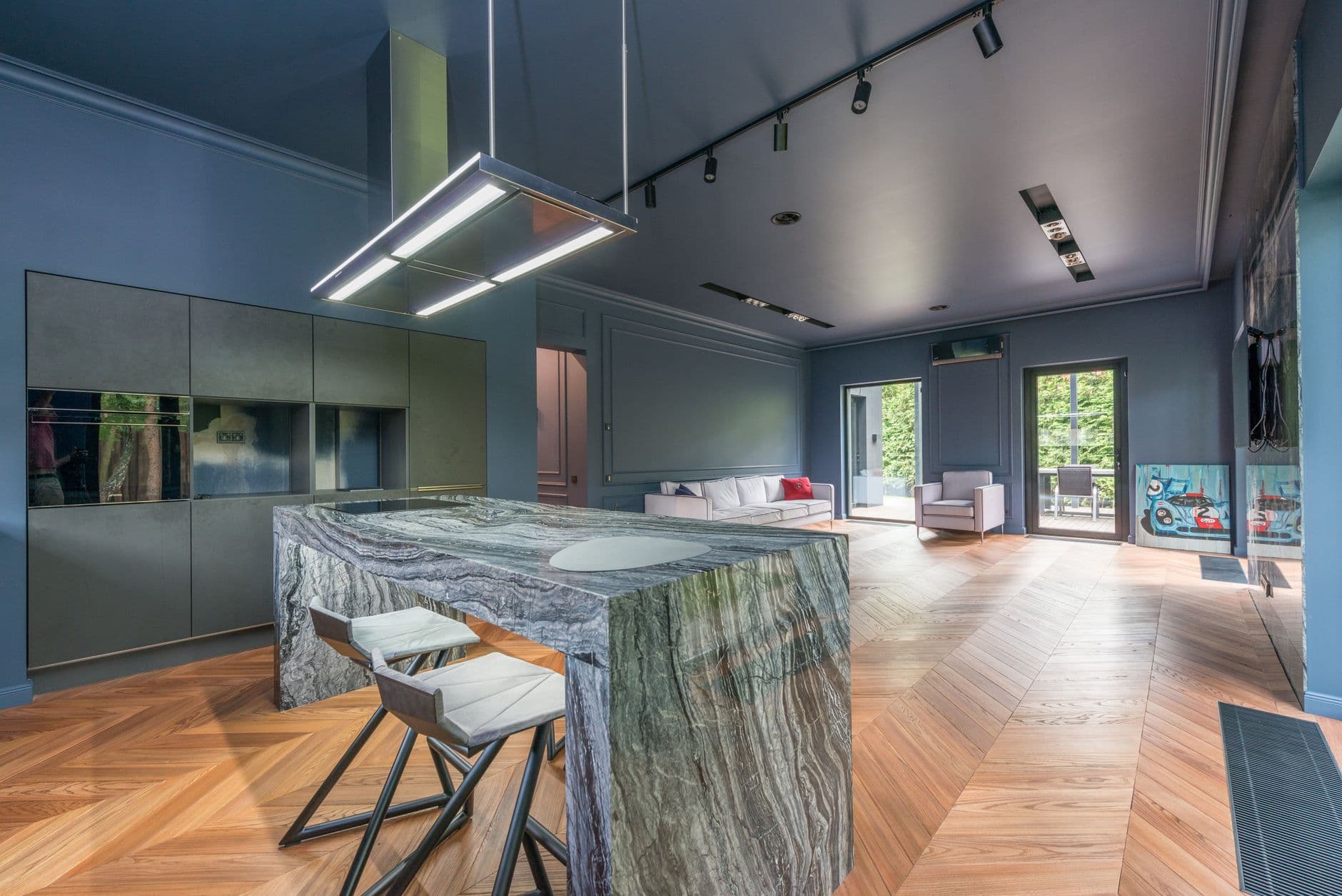 Lived-in interior with pale stone surfaces, warm timber and soft natural light