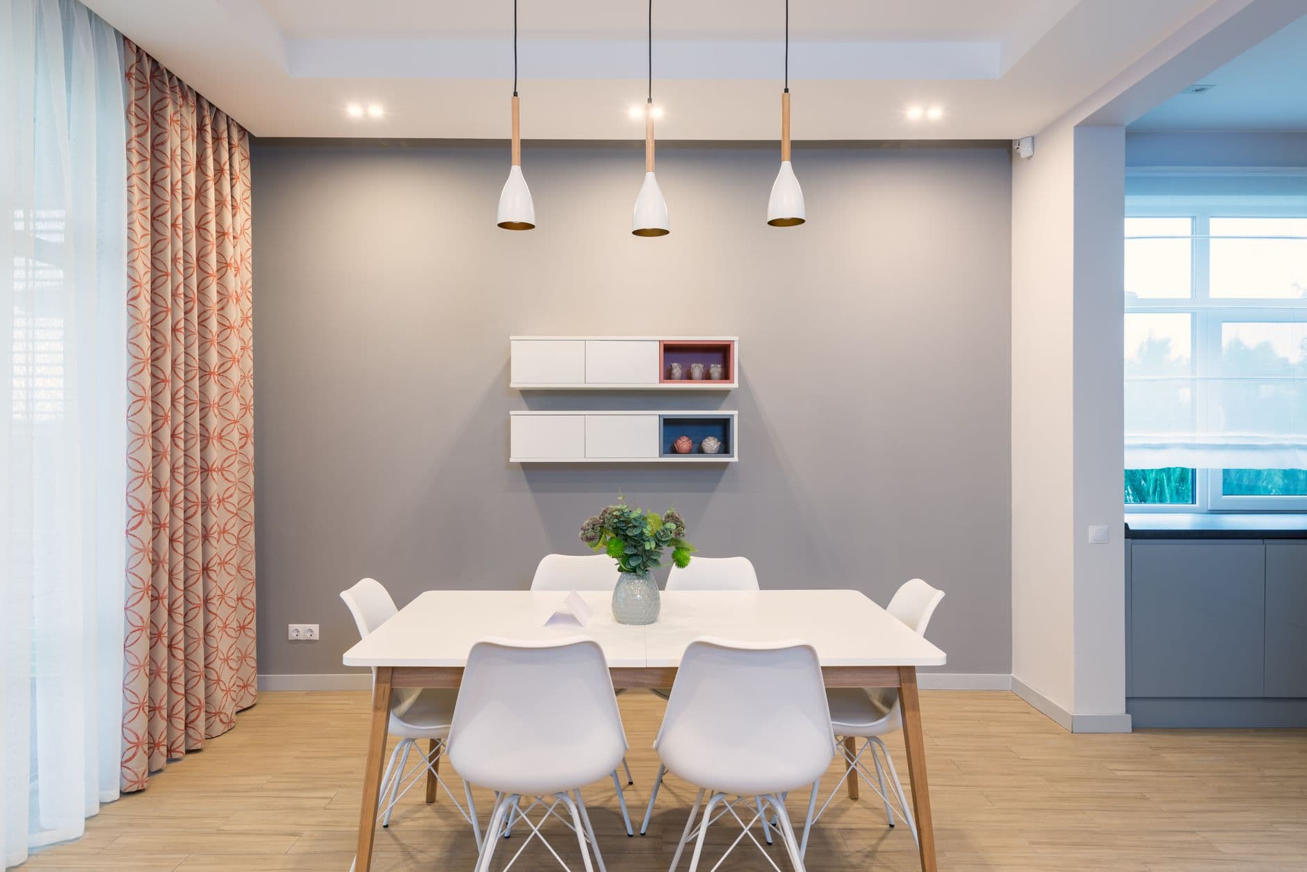 Start with the height: 75 to 90 cm above the table
